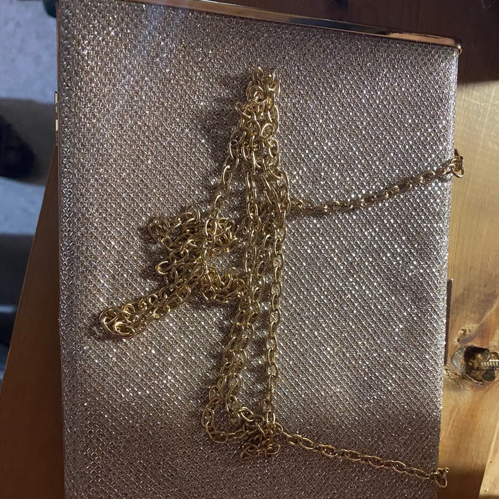 Gold purse with chain strap new never used